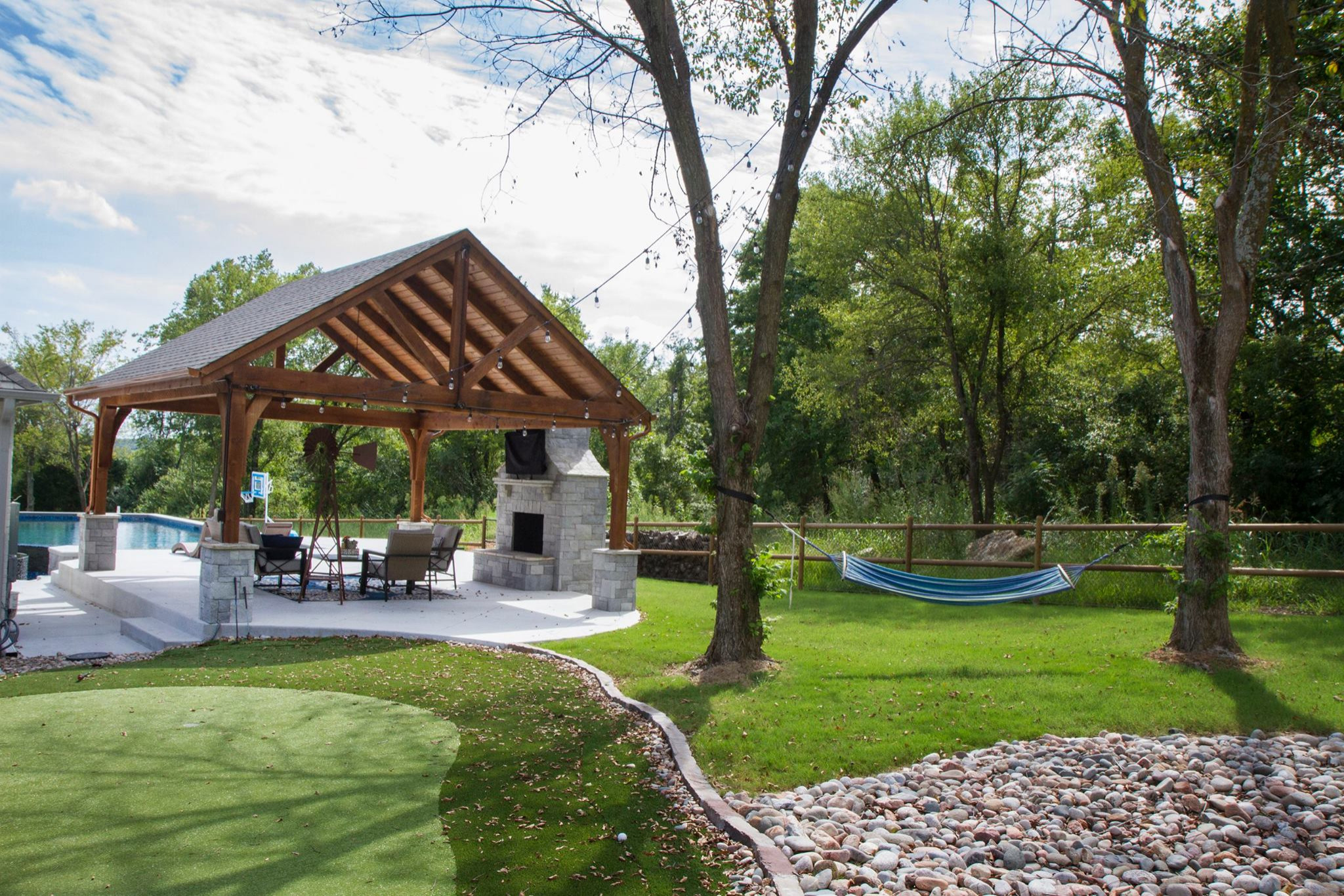 Custom outdoor living space with covered patio and pool in Southlake Texas